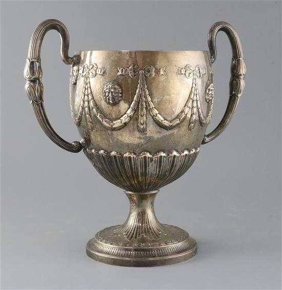 A George III Irish silver two handled pedestal cup, 66.5 oz.